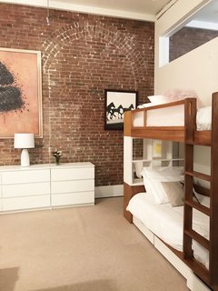 Experience New York City's Eclectic Side at One of These Modern Short-Term Rentals - Photo 6 of 11 -