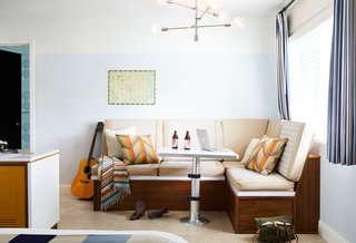 A Napa Valley Motor Lodge Reinterprets the Classic Roadside Motel - Photo 2 of 8 - The rooms are reminiscent of midcentury motor lodges. The camper van-style bench here can be converted into a double bed.