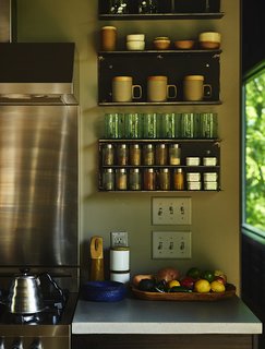 A Rustic-Modern Cabin Inspired by Japanese Bungalows and Shou Sugi Ban - Photo 3 of 12 - The kitchen’s concrete countertop is by Dex Industries.