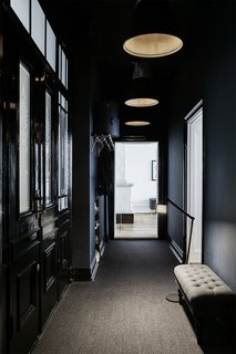 A Careful Renovation of a 19th-Century Flat in Gothenburg Brings it Back to Life - Photo 1 of 11 - The apartment building dates to 1888, and the various residences feature high ceilings, mirrored doors, massive skirtings, and richly ornamented white stucco. "When it was built, there was no central heating, so each and every room had tiled, wood-burning stoves," says resident Martin Ringqvist.