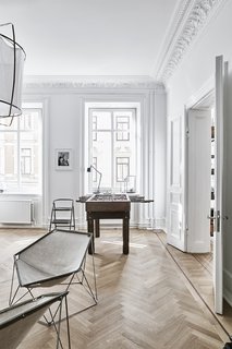 A Careful Renovation of a 19th-Century Flat in Gothenburg Brings it Back to Life - Photo 5 of 11 - The Penta chairs are by Kim Moltzer and Jean-Paul Barray.