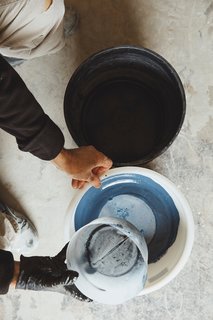Go Behind the Scenes With a Process-Driven Handmade-Tile Company in California - Photo 12 of 13 - Mixing Pigments: The glaze particles—composed of silica, metal oxides, colorants, and opacifiers—are weighed, mixed, and sifted, then blended with water before they’re applied to each tile. 