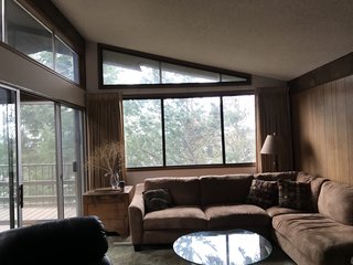 A Family-Run Operation Refreshes a Portland Midcentury, Now Offered at $899K - Photo 4 of 13 - Before: Living Room