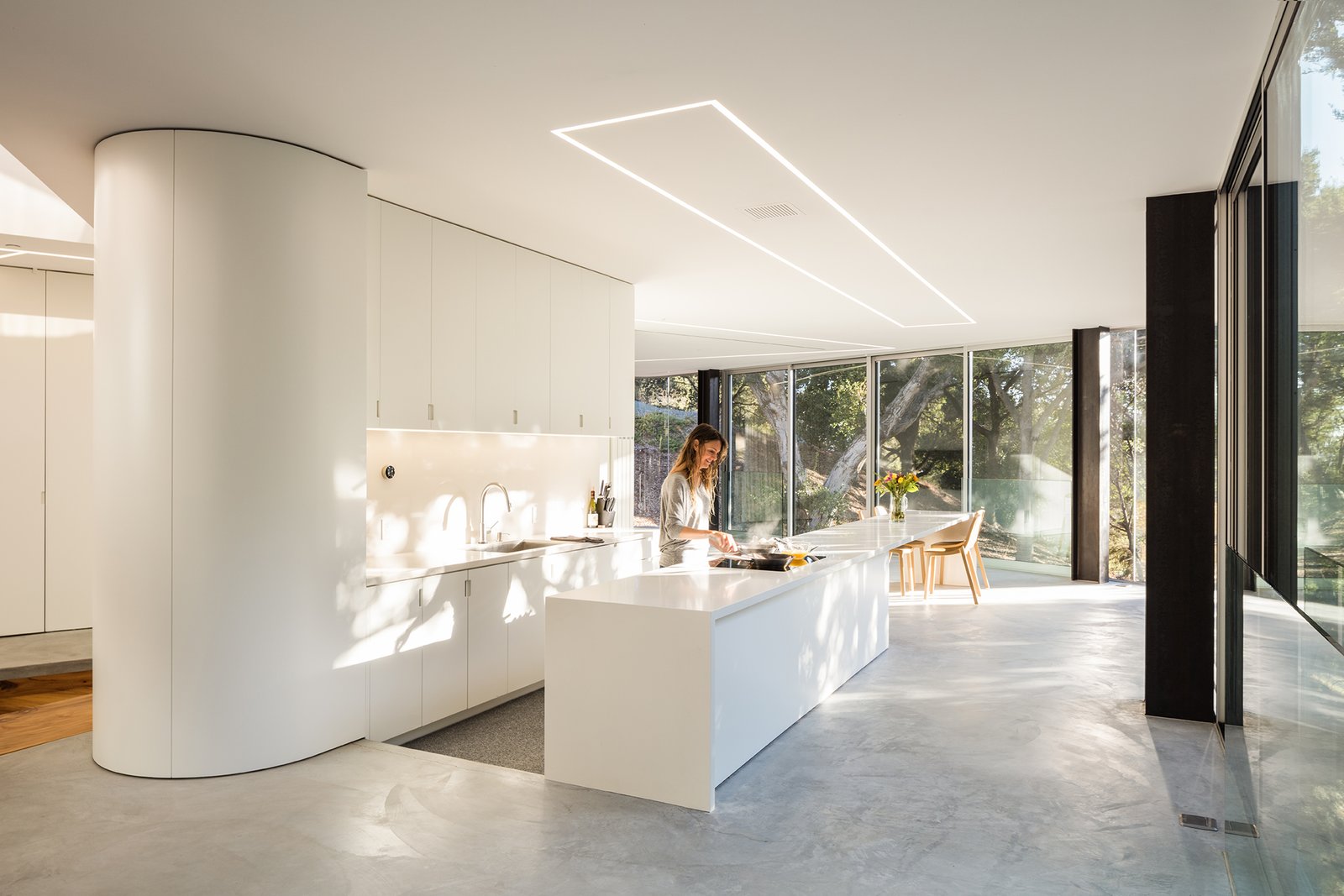 The living room, office, and kitchen are sunken into the concrete floor, providing delineation in the open plan.
-
Cupertino, California
Dwell Magazine : September / October 2017