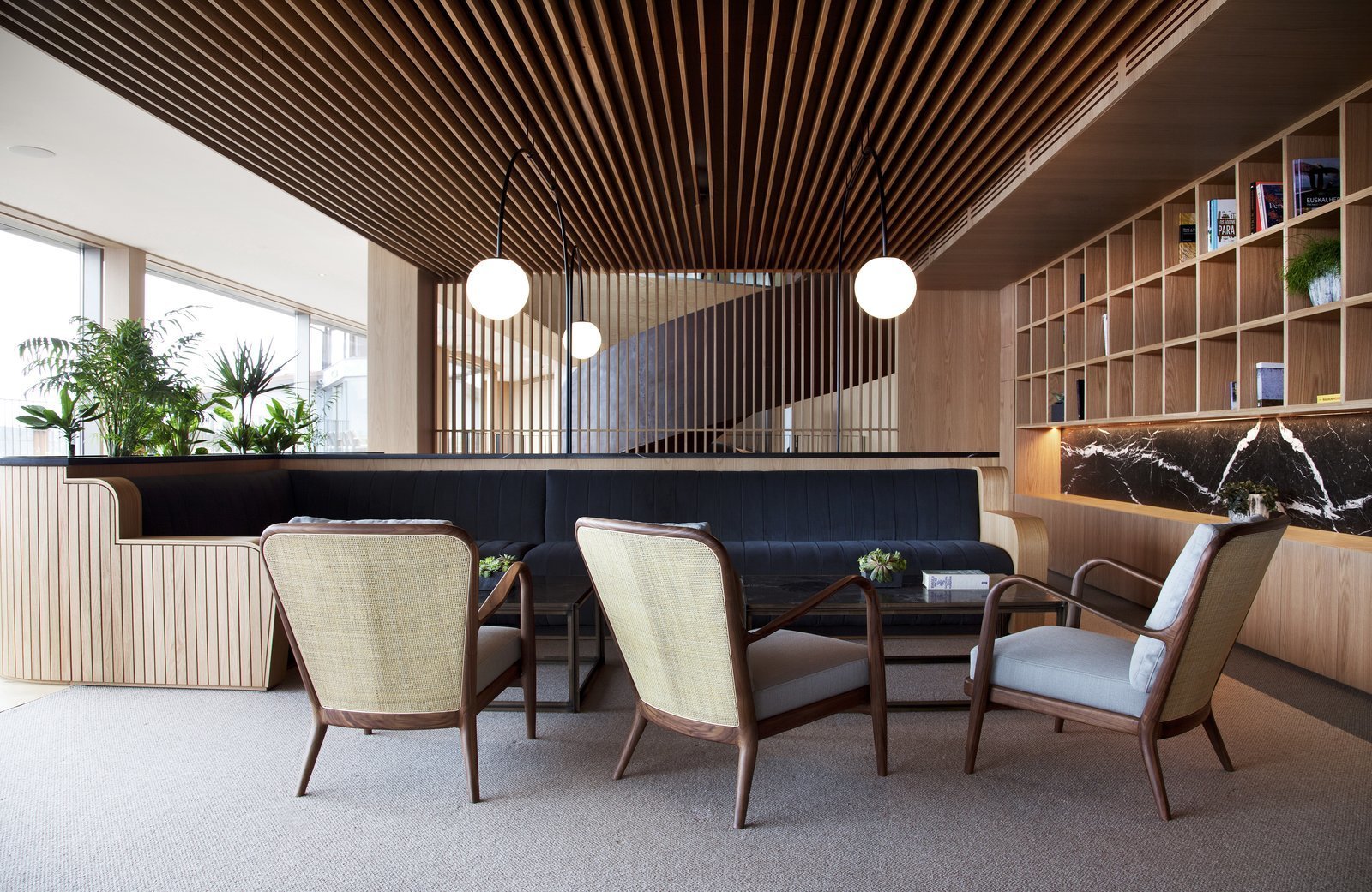The common areas are completely paneled in wood, which seamlessly flows connecting the common areas of the hotel.
In addition to its own restaurant, the hotel is complete with a smart wellness center, lounge, wine cellar, and a relaxed snack bar called Oteiza, which features Subijana's cuisine in a more relaxed setting. With beautiful design and furnishings, innovative architecture, Michelin star-rated food, and a picturesque coastline, Hotel Akelarre has all the elements you need—and more—for a perfect escape to Spain.