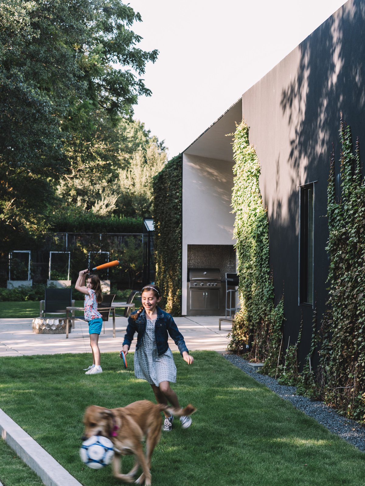 The west patio opens up to a grass area that can be enjoyed by many.