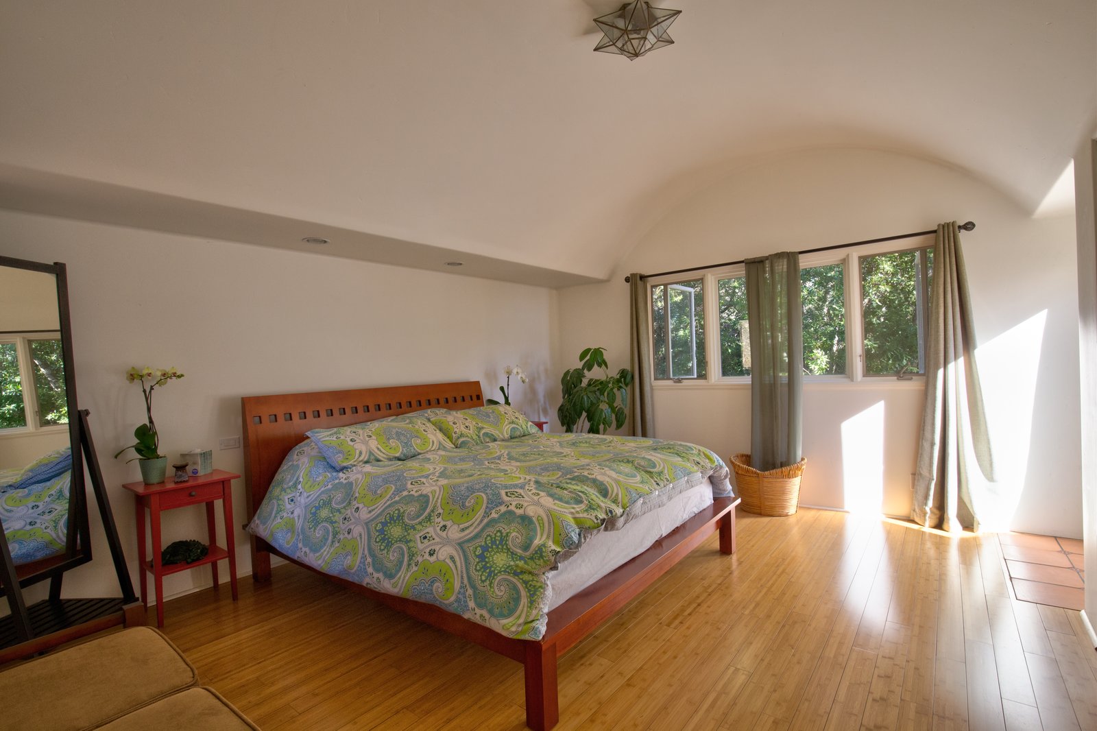 The main bedroom has a generous closet and outdoor access.