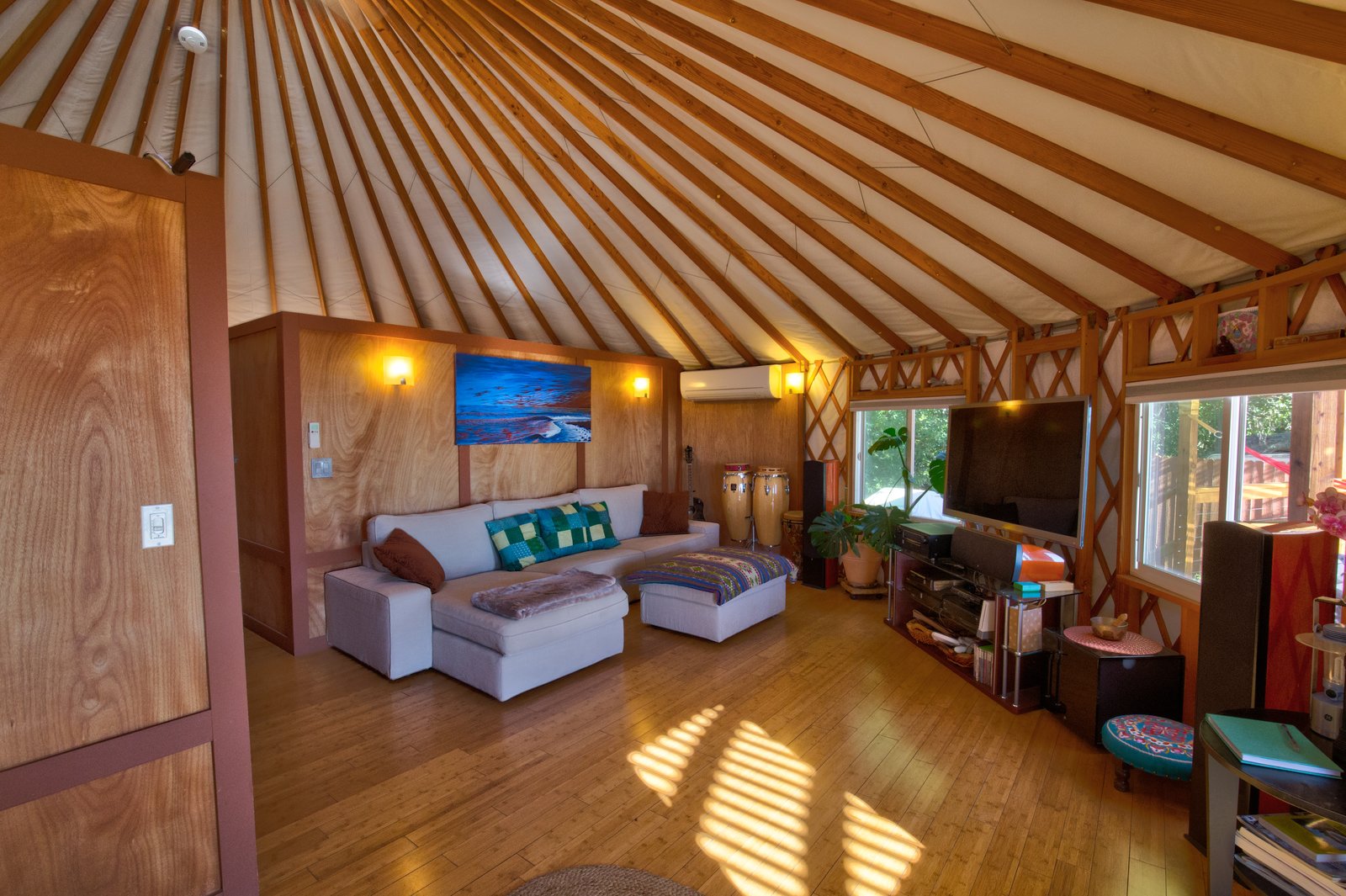 The living room couch converts into an additional bed. The well-appointed entertainment system includes movies, video games, and board games; guests can also play any of the instruments provided.