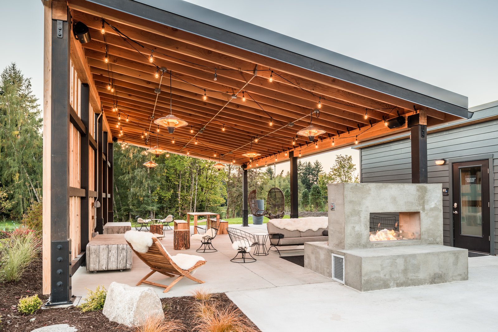 The Pavilion has plenty of cozy seating, a cast concrete fireplace, and a sound system.
