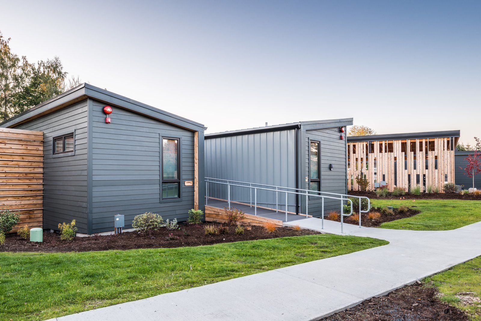Paved walkways connect each unit to the public spaces.