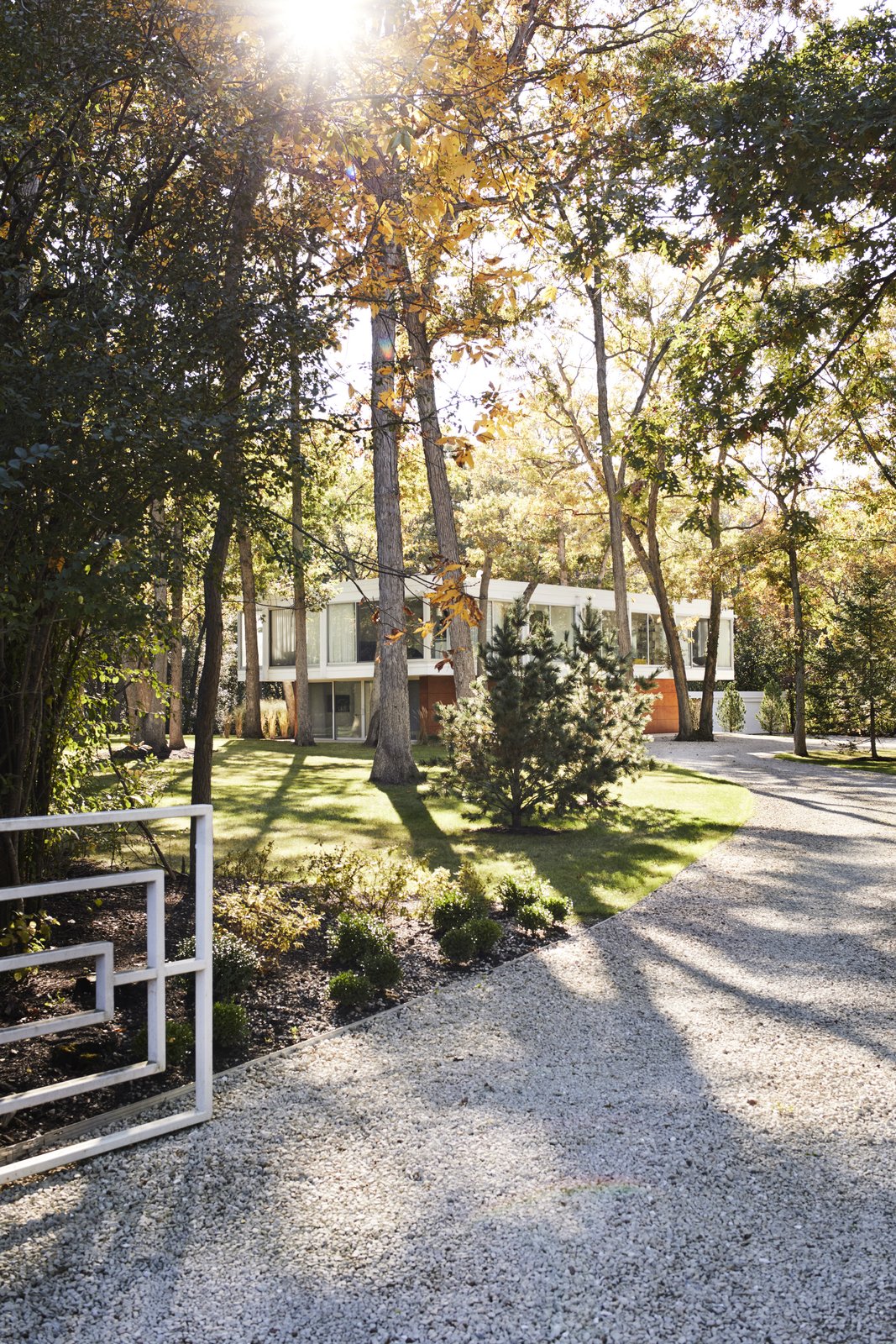 Taking an active role in the restoration of a midcentury house she and her husband bought near Chicago in 2013, Eva Kowalow honored the vision of the home’s architect and previous owner, Jack Viks, while updating the structure to fit her style and the needs of her family. The entrance gate, designed by Viks, is original.