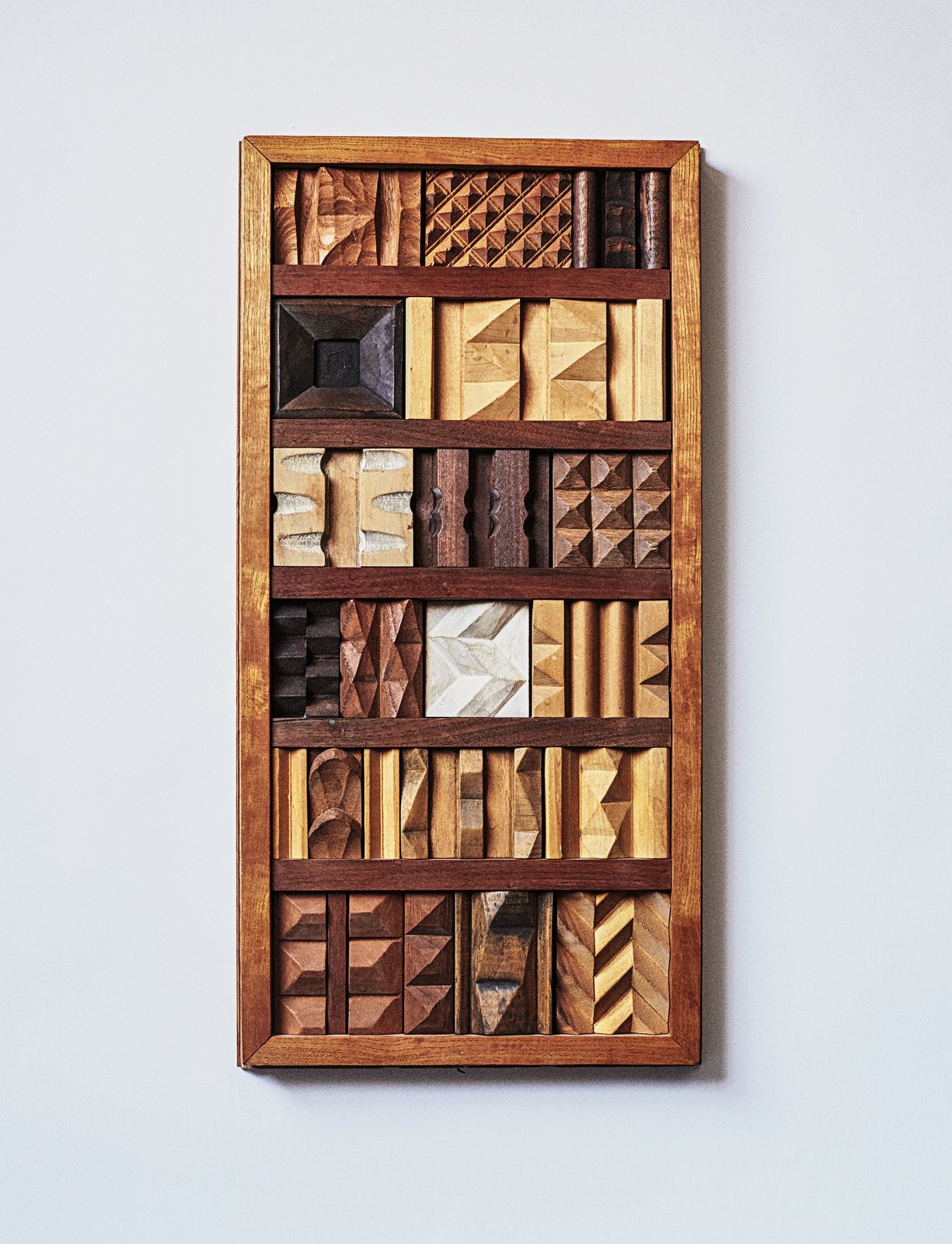 At WXY’s office, principal Claire Weisz keeps a carving sample board (like a fabric sample chart for woodworkers) that belonged to master craftsman Lynn Ford.