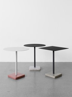 A distinctive terrazzo base is the defining feature of this Daniel Enoksson–designed table, appropriate for indoor or outdoor settings.