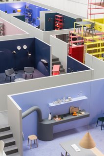 The brand presented products both new and old in a series of room-like vignettes.