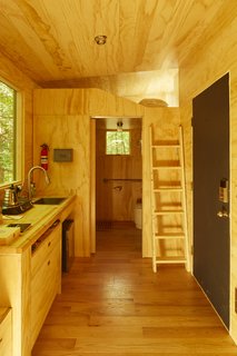 The Isidore cabin has a sleeping loft with a clerestory window.
