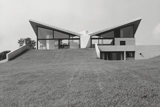 From Bauhaus Student to Brutalist Supreme: Highlights by Marcel Breuer - Photo 3 of 9 - After declaring that he was done designing houses in the late 1960s, Breuer took a commission to design the Sayer House in France in 1972. He accepted only because the residents were willing to build a design that Breuer had proposed to another client in 1959. Its defining feature is a hyperbolic paraboloid roof made of board-formed concrete.