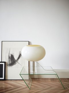 How Rodolfo Dordoni Rebranded Foscarini With a Winning Lamp - Photo 5 of 7 - There are three versions of the table lamp, each with a slightly different size and profile. A specific color is designated for each—brown, gray, or bamboo green—and white is an option for all three.