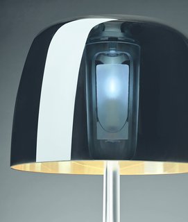 How Rodolfo Dordoni Rebranded Foscarini With a Winning Lamp - Photo 3 of 7 - The 25th anniversary version of Lumiere features a metallic glass shade that still lets light pass through; four layers (paliesco, crystal, white, and metallic coating) make up the piece.