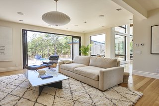 You Won't Lose Your Wi-Fi Connection at This Hamptons Retreat - Photo 5 of 6 - Solid white oak flooring is installed throughout. The home's windows and doors are by Andersen Windows.