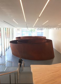 Two aspects that the morning's speakers were ecstatic to share included the facts that they're offering free access to the ground-floor galleries—45,000 square feet to be exact—as well as free admission for visitors 18 and under. The new entrance features Richard Serra's epic sculpture Sequence, which was created in 2006.
