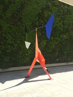 Standing proud in one of the outdoor spaces is Alexander Calder's Big Crinkly, an animated painted metal sculpture from 1969. Visitors can wander freely around this piece in an area that's framed by a wall of lush greenery.