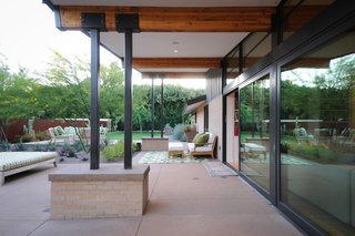 Taking it to the Desert With Dwell Home Tours - Photo 12 of 12 - After adding a garage, guest house, pool, and garden, Woolsey created a large patio designed for outdoor dinner parties where friends and family can spend long evenings enjoying the desert sunsets.