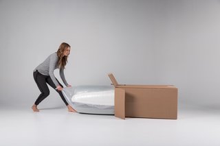 The Mattress Company That Lets You Be Your Own Expert - Photo 4 of 7 - When a Luxi mattress is delivered to your door, it's held within a convenient box and carefully rolled up in a protective wrap.