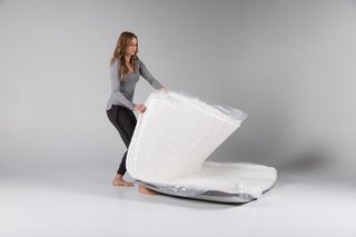 The Mattress Company That Lets You Be Your Own Expert - Photo 5 of 7 - The next step is to unroll the mattress—and it's ready to go. After opening the package and placing it where desired, the only thing left to do is unzip it and adjust the layers to your preference.