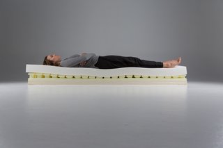 The Mattress Company That Lets You Be Your Own Expert - Photo 7 of 7 - The comfort of the mattress is made possible by the internal structure that's made up of a keen layering of special materials, all pieced together in Luxi's American manufacturing facility. From top to bottom, these layers include latex, memory foam, their Support Balancing Technology foam, and a breathable urethane foam base. It's then all wrapped together by a sock covering, keeping it tailored and clean.