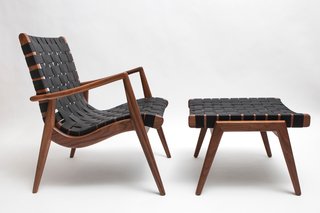 An Icon's Legacy is Revived by a Father-Daughter Bond - Photo 9 of 11 - Mel’s Woven Leather Armchair from 1956 was one of his strongest pieces. Now available in the same dapper silhouette and made of solid walnut, it sits modern as ever with a matching ottoman. 