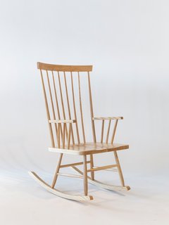 An Icon's Legacy is Revived by a Father-Daughter Bond - Photo 11 of 11 - Today’s rendition of the Rocking Chair, shown here in the natural ash finish, relies on its clean lines and meticulous craftsmanship.
