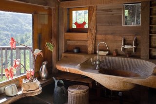 Must-See Discoveries from San Francisco’s Design + Art Fair - Photo 12 of 13 - J.B. Blunk’s first real masterpiece was his own home he built in Inverness, California. He hand-carved intricate details throughout the home, where it fit harmoniously with its natural surroundings. We learned that he would often find a tree he admired in his backyard and turn it into a sculpture without removing it from the ground. Shown here is his sink he carved by hand with a chainsaw and chisel, his chosen tools of the trade. Photo by Kodiak Greenwood, courtesy of Reform Gallery. 