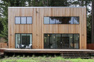 Loewinger’s three-bedroom Russian River house was constructed in a year with the combined efforts of Loewinger, architect Ravit Kaplan, contractor Chris Zipperian, and a handful of local collaborators. Though her original plan was to create a black exterior, she ended up covering it with cedar, which accounts for the various shades of light-hued wood. It’s topped off with a simple metal roof. 