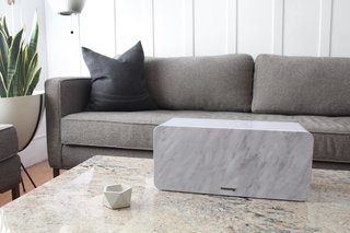 A Close Look at Happy Plugs’ Sound Pieces - Photo 1 of 3 - The Happy Plugs sound piece is shown here with the removable "marble" grill. It’s made up of a stretchy material that gives the look of stone, which easily snaps on and off of the front of the speaker. Photo by Amanda Vidmar 