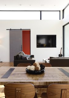 See How Technology Turned This Vacation Home Into a Connected Family Hub - Photo 4 of 5 - With the Security Kit, they can receive instant notificiations and will have access to live video and mobile camera viewing. To go along with the kit, they also ordered a Deadbolt Lock, a Lamp Dimmer, and a Nest Learning Thermostat—all of which can be connected through the same system. 