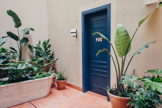 A Boutique Hotel That Captures the Creative Spirit of Barcelona - Photo 7 of 12 - Max Rippon and Ausias Perez painted the numbers on the doors in a similar style to the original signage of the building. 