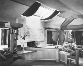 Iconic Perspectives: Frank Lloyd Wright's Hollyhock House - Photo 1 of 13 - The Hollyhock House reveals Wright’s usage of an open concept plan. Our house docent described to us, "For Wright, compression was always followed by relief. After passing through low entry hallways and multiple columns, you then enter into large open spaces through dramatic passages." 