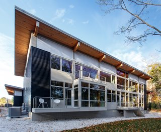 At the top of homeowner Bob Dahl’s wish list was a shed roof, applications of industrial materials, and tons of glass. Courtesy