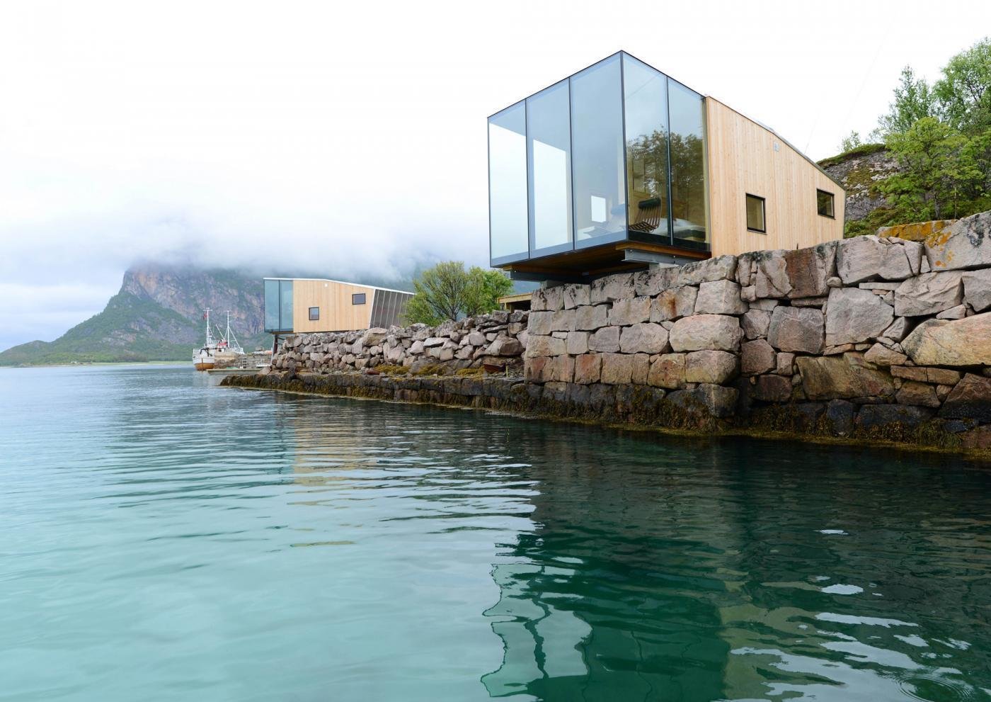 This boutique hotel on Norway's Manshausen Island is made up of four sea cabins—one of which juts out from a natural ledge. Each of them fit two to four travelers or a family of five.