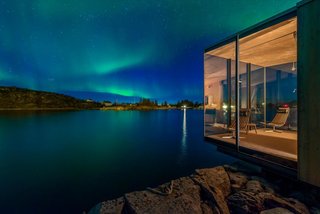 Have You Ever Wanted to Stay in a Norwegian Sea Cabin? - Photo 8 of 8 - While you’re there, make sure to try out activities or sports that take advantage of the incredible natural surroundings. You’ll be able to rent a boat, kayak, snow shoes, a bicycle, or fishing and diving equipment. You can also even sign up for a group fishing trip or have a chance to see the winter lights.