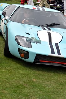 A Day at the Pebble Beach Concours d’Elegance Car Show - Photo 2 of 9 - Brought to the event by the Revs Institute for Automotive Research, Inc. in Naples, Florida, this 1966 Ford GT40 raced for the first time at the 12 Hours of Sebring race in 1966. After enduring several eventful races, it concluded its career after participating at Montlhéry. It’s been carefully preserved ever since. 