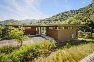 Dwell Home Tours Lands in Silicon Valley - Photo 4 of 15 - The exterior siding of the Moody Road House is made up of ipe wood and includes rain screen detailing. Atkinson worked with Santa Cruz-based landscape architect Joni L. Janecki to complete the nature-immersed plot.
