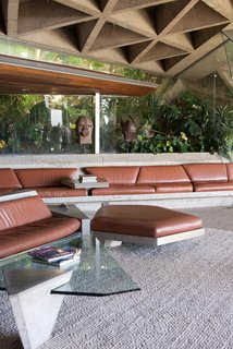 10 Modern Homes That Made a Star Appearance in Films - Photo 4 of 16 - Throughout the house, there are a number of details that are clearly "Lautner." Working with Goldstein, the architect was given the opportunity to design custom furniture pieces, which is something he didn’t normally get the chance to do. His angular, minimalist style was carried throughout, including in the custom leather-and-concrete sofas spread throughout the living room.