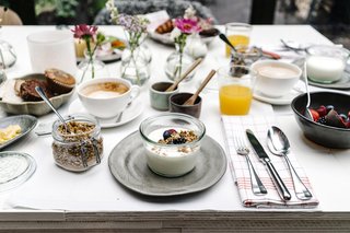 A Visual Journey Through Stockholm's Hotel Ett Hem - Photo 8 of 12 - A complimentary breakfast is served each day, which includes fresh yogurt, house-made granola, pastries, avocado toast, and cheese.
