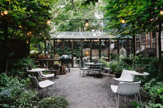 A Visual Journey Through Stockholm's Hotel Ett Hem - Photo 9 of 12 - You'll find outdoor seating and a fire pit in the courtyard. The hotel's chefs can be found here grilling for the evening meals. 