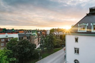 A Visual Journey Through Stockholm's Hotel Ett Hem - Photo 11 of 12 - This view highlights the sunset that can be seen from the rooms on the top floor, which overlooks the Östermalm neighborhood. 