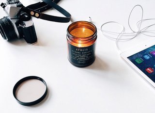 Stocking Stuffers That Will Please the Modernists in Your Life - Photo 10 of 11 - The portable design is perfect for bringing light (and a subtle cypress fig perfume) anywhere. Apolis Transit Issue Table Candle, $24