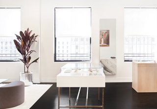 This New Jewelry Showroom Celebrates 'Made in L.A.' From Top to Bottom - Photo 5 of 9 - Lee’s jewelry is contained in bespoke polished brass and white oak displays. The interior is lined with traditional linen jewelry holders.