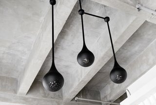 This New Jewelry Showroom Celebrates 'Made in L.A.' From Top to Bottom - Photo 9 of 9 - As the duo’s first experiment with lighting design, each pendant was spun by hand in L.A. and has a custom perforated pattern that allows light to shine through.