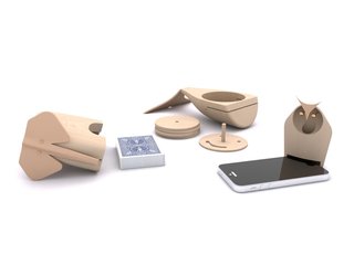 After making the sketches, they moved to creating 3D models on the computer. In these renderings, you can see how they were able to capture the personality of each figure. The elephant acts as a card holder (for a custom set of cards that's included), the whale is a wooden coaster set of four, and the owl is a sound amplifier.